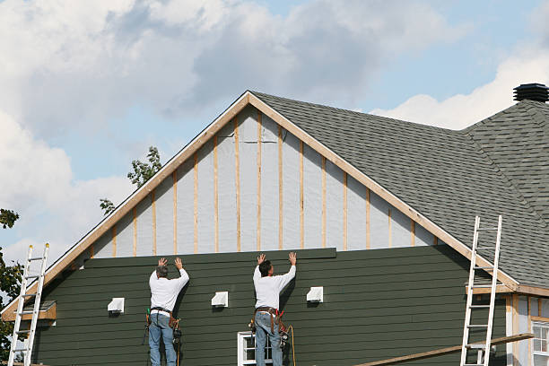 Professional Siding Contractor technician working in Highland, NY
